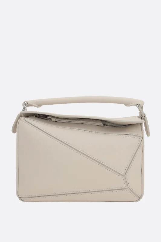 Puzzle small handbag in Satin leather